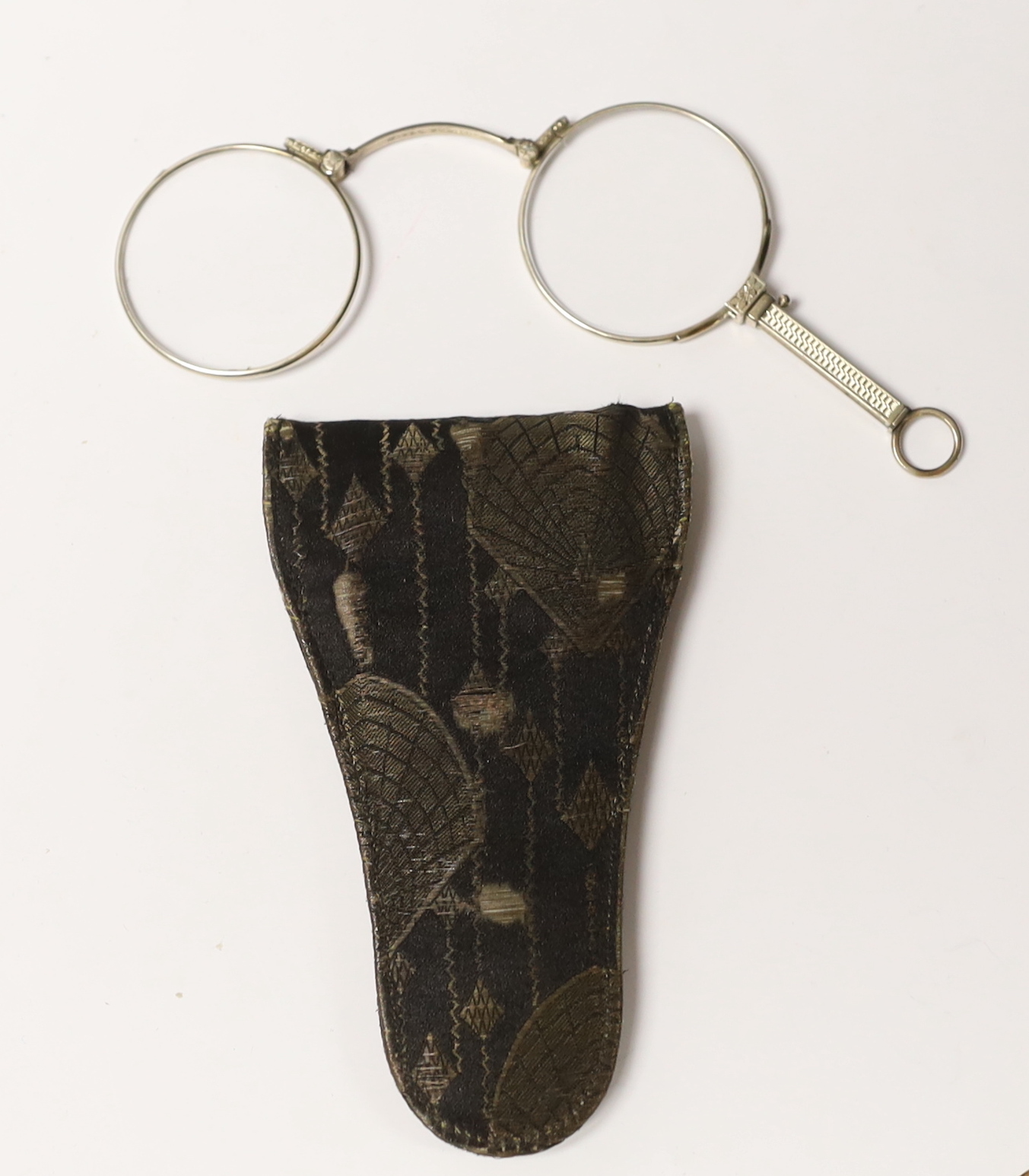 C. W. Dixey & Sons, a pair of white metal lorgnettes, in a leather case